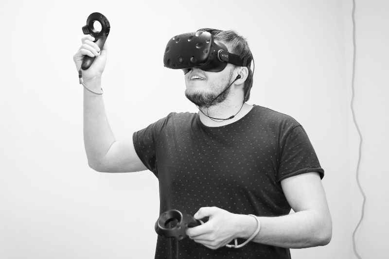 Guy Playing with HTC Vive